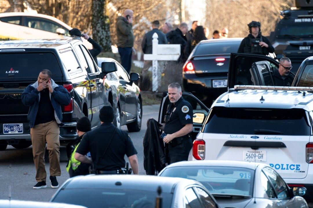 Investigation Shows Armed Officer Was Hostage at Home of Grammy Winner Who Was Killed by Police