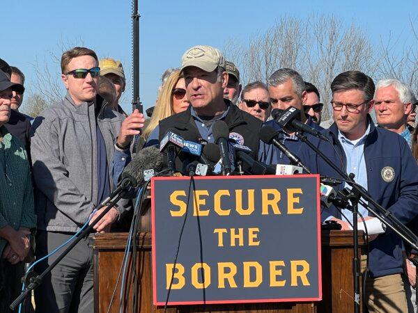 Rep. Mark Green (R-Tenn.) speaks while standing with Republican members of Congress in Eagle Pass, Texas, on Jan. 3, 2024. (Charlotte Cuthbertson/The Epoch Times)