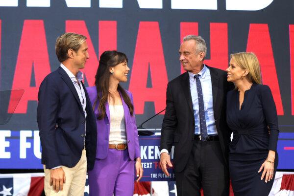 (L–R) Jacob Strumwasser, Nicole Shanahan, independent presidential candidate Robert F. Kennedy Jr., and Mr. Kennedy's wife, Cheryl Hines, at a campaign event to announce Ms. Shanahan as Mr. Kennedy's running mate at the Henry J. Kaiser Event Center in Oakland, Calif., on March 26, 2024. (Justin Sullivan/Getty Images)