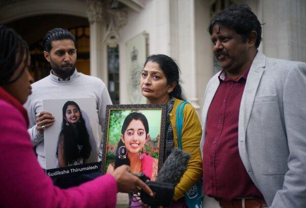 Brother Varshan Thirumalesh, mother Revathi Thirumalesh, and father Thirumalesh Hemachandran, the family of Sudiksha Thirumalesh, speak to the media outside the Supreme Court in London on April 15, 2024. (Yui Mok/PA)