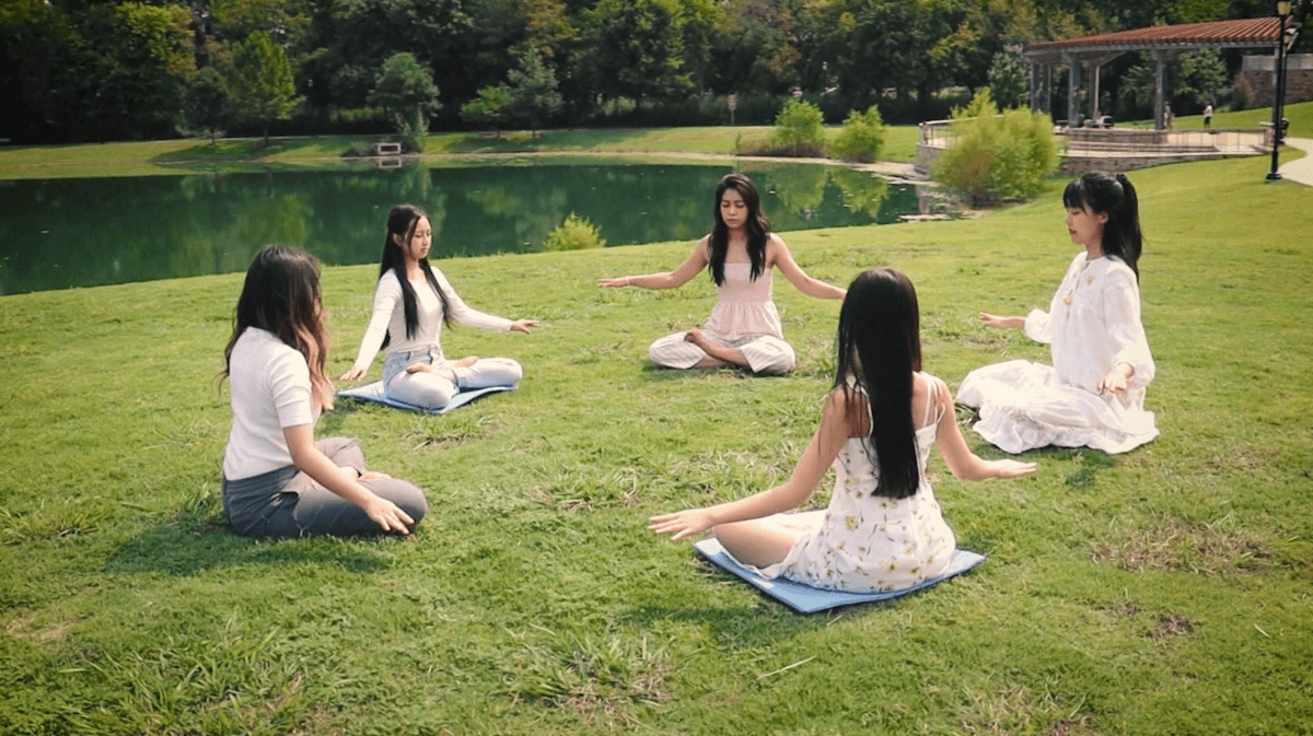 Falun Gong practitioners meditating, in "The Long Arm of Beijing." (Falun Dafa Information Center)