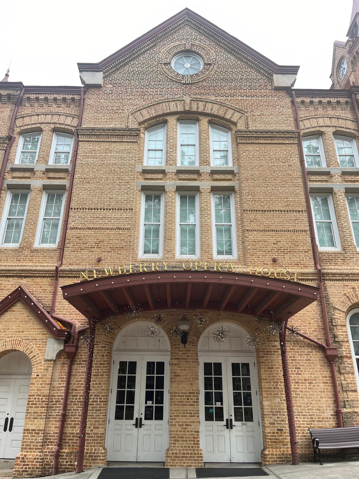 The exterior signage of the Newberry Opera House has welcomed visitors for over 15 decades. (Deena Bouknight)