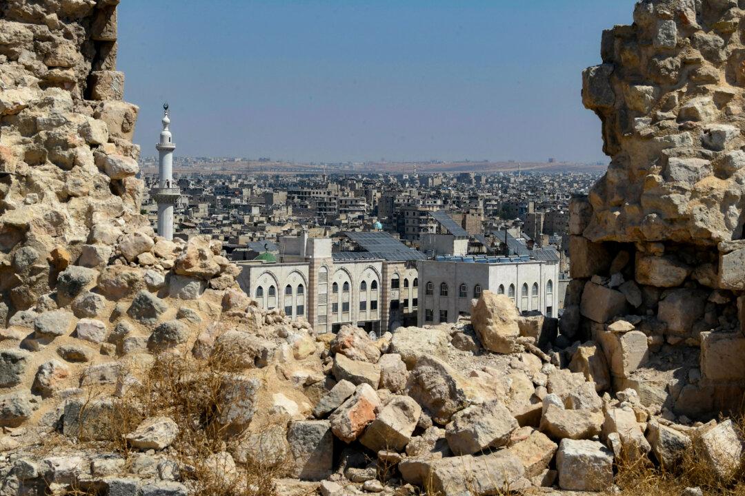 US-Backed Kurdish Group, Damascus Agree to Cease-Fire in Northern Syria