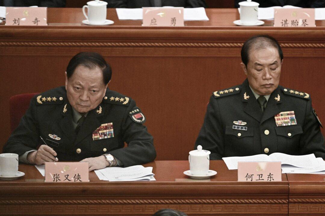 Chinese Military Editorial Distances Xi From Purged Generals Ahead of Key Political Meeting