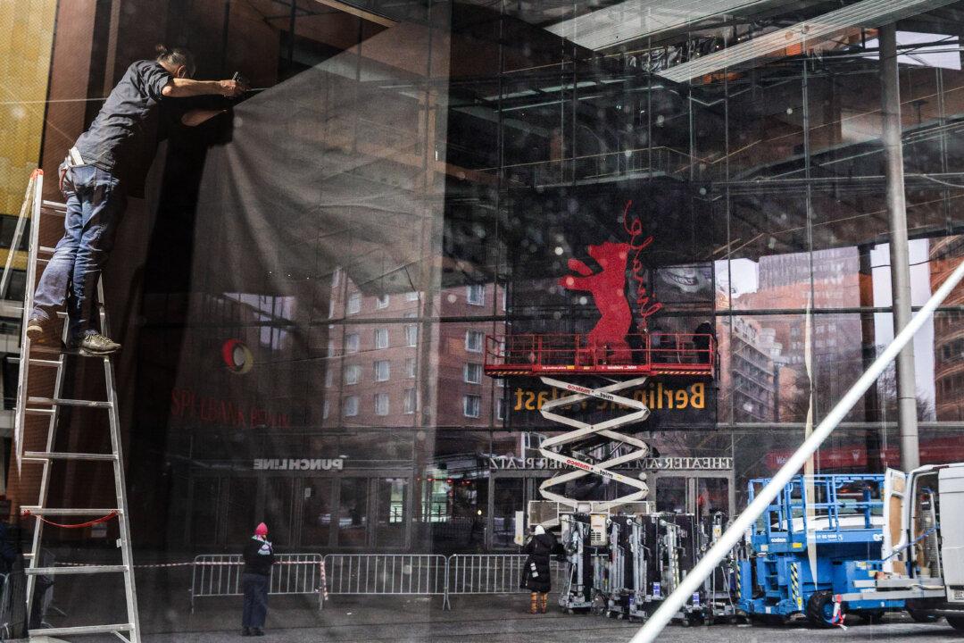 BERLIN, GERMANY - FEBRUARY 6: A reflection at the construction site as workers set up the Berlinale bear logo outside of the Berlinale Palace venue ahead of the 76th Berlinale International Film Festival at on February 6, 2026 in Berlin, Germany. The Berlinale International Film Festival will take from February 12 until 22 in Berlin. (Photo by Omer Messinger/Getty Images)