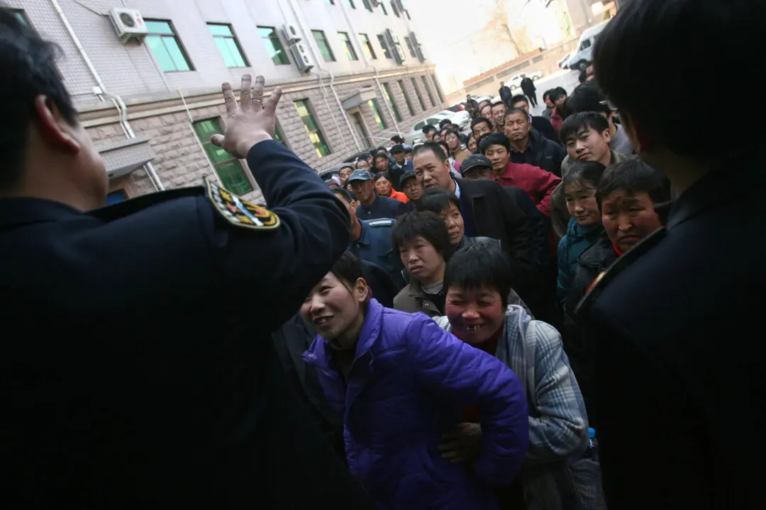 Workers Across China Demand Unpaid Wages Ahead of Lunar New Year